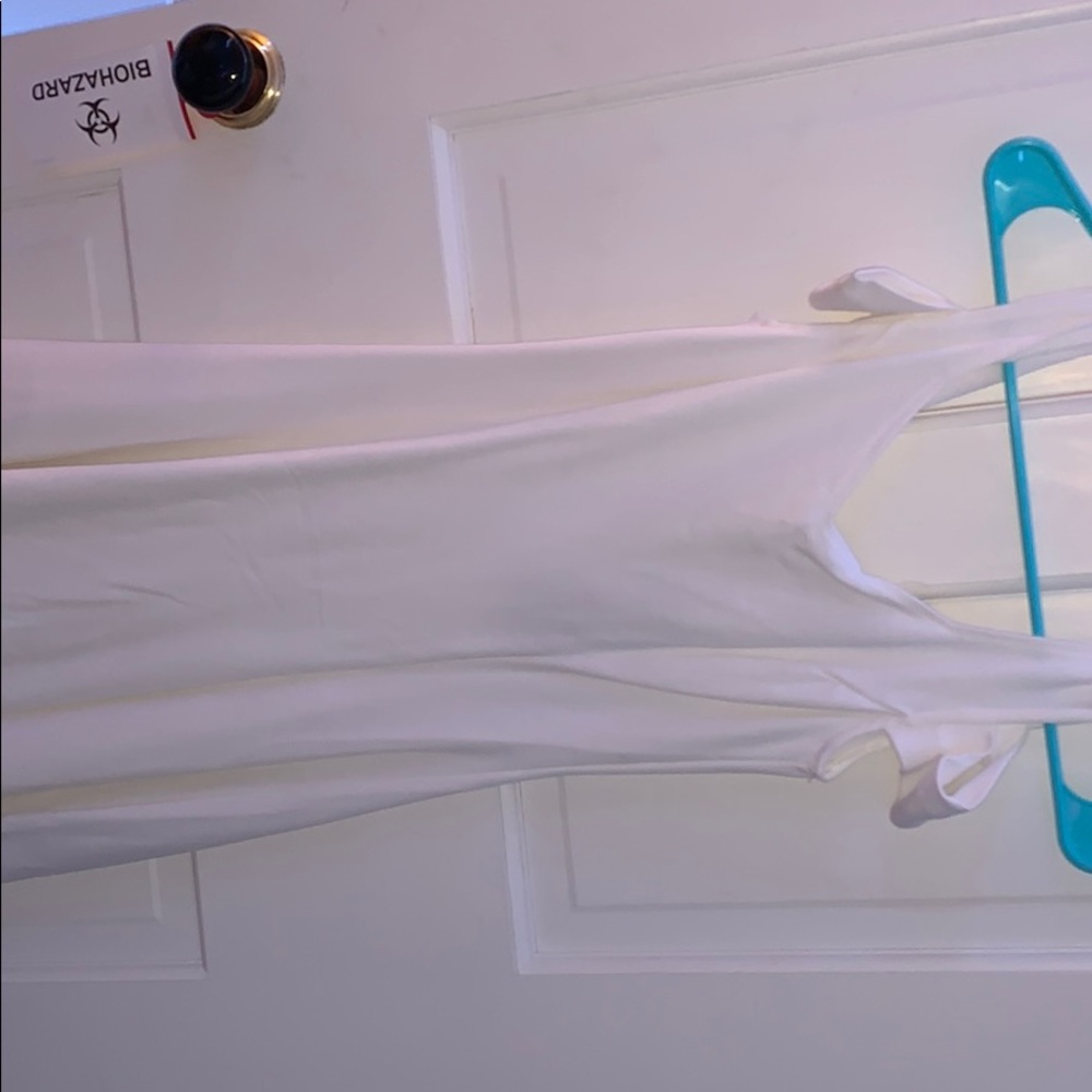 white flowy dress with arm details